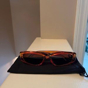 Orange frame black lens sunglasses